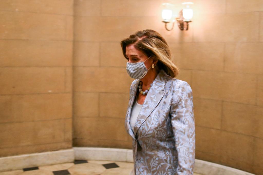 Pelosi Narrowly Re-elected Speaker, Faces Difficult 2021