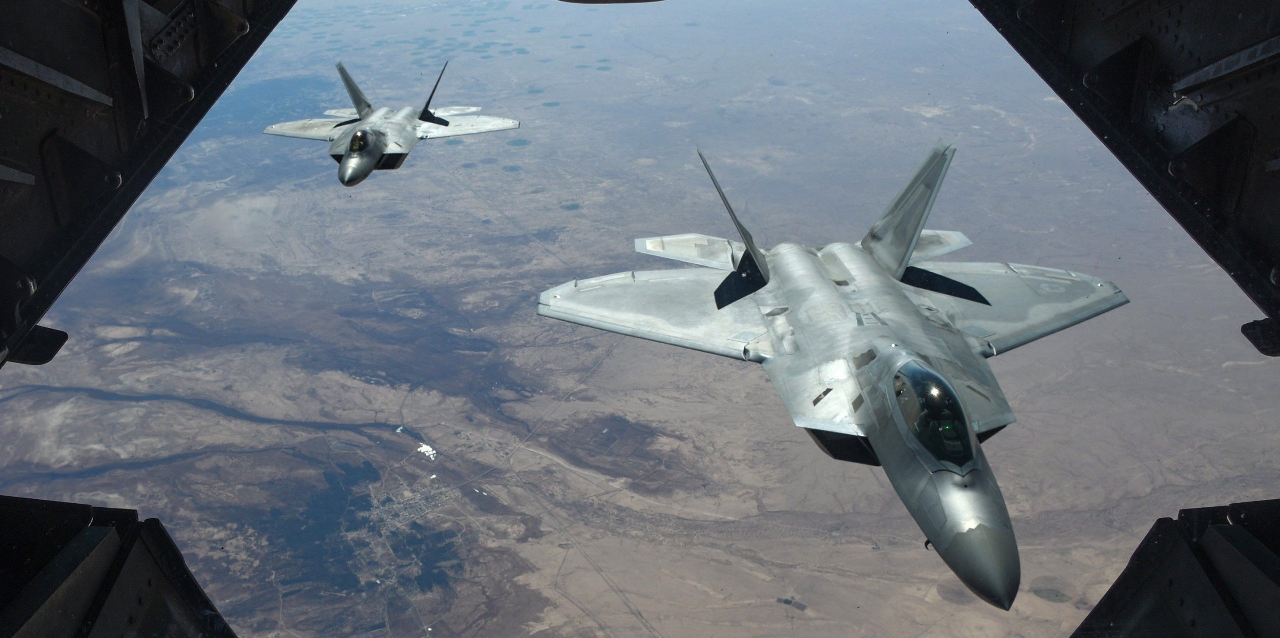 U.S. Begins Retaliatory Air Strikes in Iraq & Syria