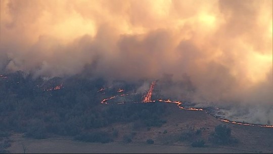 Some Left Helpless to Watch as Largest Wildfire in Texas History Devastates Their Town