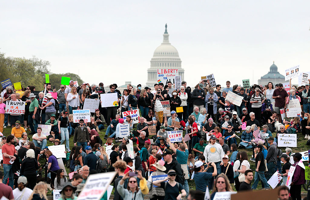 Protesters Tee Off Against Trump And Musk In “Hands Off!” Rallies Across The U.S.
