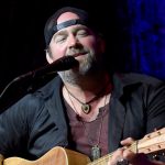 Watch Lee Brice’s New Video for “Hey World,” Featuring Blessing Offor