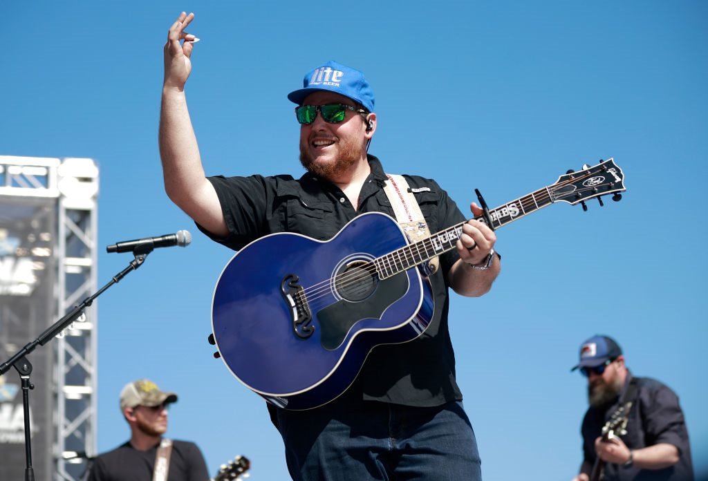 WATCH: Luke Combs Teaches Ed Sheeran How to Shotgun a Beer