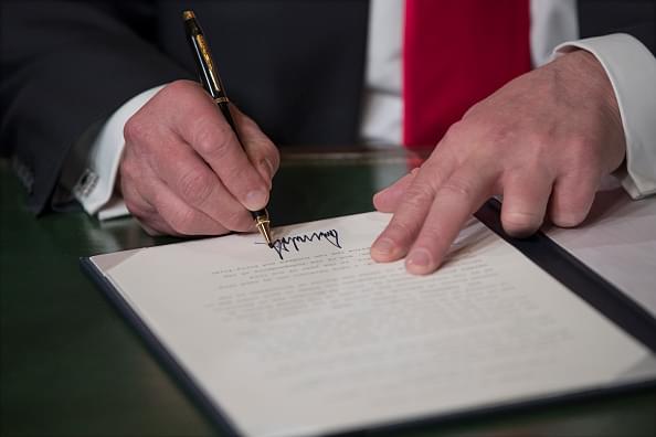 Trump Signs Coronavirus Relief Legislation Into Law