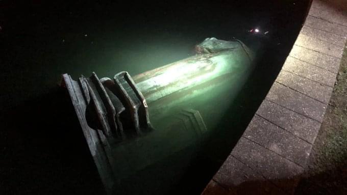 [PHOTOS] A Christopher Columbus Statue Winds Up in a Richmond, VA Lake