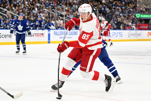 Oct. 5, 2023 ~ Detroit Red Wings forward Elmer Soderblom (85) shoots the puck against the Toronto Maple Leafs in the second period at Scotiabank Arena. Photo: Dan Hamilton ~ USA TODAY Sports
