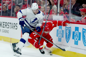 Oct. 14, 2023 ~ Detroit Red Wings center Dylan Larkin is checked by Tampa Bay Lightning defenseman Haydn Fleury during first-period action on Saturday. Photo: Kirthmon F. Dozier ~ USA TODAY Sports