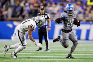 Oct. 30, 2023 ~ Detroit Lions running back Jahmyr Gibbs runs against Las Vegas Raiders defensive end Malcolm Koonce during the second half at Ford Field. Photo: Junfu Han ~ USA TODAY NETWORK