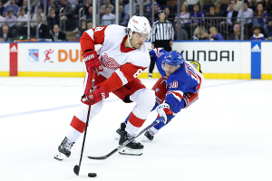 Nov. 7, 2023 ~ Detroit Red Wings defenseman Ben Chiarot (8) controls the puck against New York Rangers left wing Artemi Panarin (10) during the second period at Madison Square Garden. Photo: Brad Penner ~ USA TODAY Sports