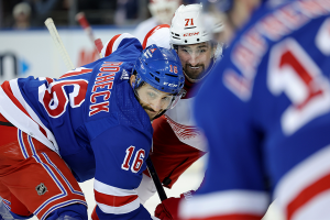 Nov. 7, 2023 ~ New York Rangers center Vincent Trocheck (16) and Detroit Red Wings center Dylan Larkin (71) fight for a face-off during the third period at Madison Square Garden. Photo: Brad Penner ~ USA TODAY Sports