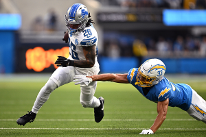 Nov. 12, 2023 ~ Detroit Lions running back Jahmyr Gibbs (26) runs the ball past Los Angeles Chargers cornerback Deane Leonard (33) during the first half at SoFi Stadium. Photo: Orlando Ramirez ~ USA TODAY Sports