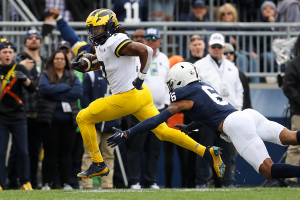 Nov. 11, 2023 ~ Michigan Wolverines running back Donovan Edwards (7) runs the ball for a touchdown against the Penn State Nittany Lions during the second quarter at Beaver Stadium. Michigan won 24-15. Photo: Matthew O'Haren ~ USA TODAY Sports