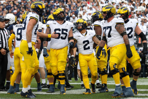 Nov. 11, 2023 ~ Michigan Wolverines running back Blake Corum (2) celebrates with teammates after scoring a touchdown against the Penn State Nittany Lions during the second quarter at Beaver Stadium. Michigan won 24-15. Photo: Matthew O'Haren ~ USA TODAY Sports