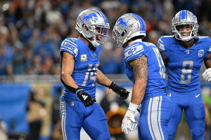 Nov. 19, 2023 ~ Detroit Lions wide receiver Amon-Ra St. Brown celebrates with teammates after scoring a touchdown against the Chicago Bears in the second quarter at Ford Field. Photo: Lon Horwedel ~ USA TODAY Sports