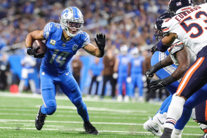 Nov. 19, 2023 ~ Detroit Lions wide receiver Amon-Ra St. Brown runs for a first down against the Chicago Bears during the first half at Ford Field. Photo: Junfu Han ~ USA TODAY NETWORK