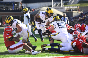Nov. 18, 2023 ~ Michigan Wolverines running back Blake Corum (2) scores a touchdown against the Maryland Terrapins during the first half at SECU Stadium. Photo: Brad Mills ~ USA TODAY Sports
