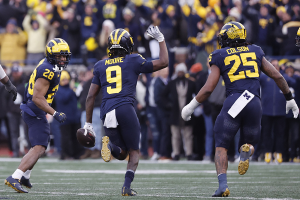 Nov. 25, 2023 ~ Michigan Wolverines defensive back Rod Moore (9) celebrates after he makes an interception in the second half against the Ohio State Buckeyes at Michigan Stadium. Photo: Rick Osentoski ~ USA TODAY Sports
