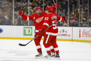 Nov. 24, 2023 ~ Detroit Red Wings center Dylan Larkin (71) celebrates with left wing David Perron (57) after Peron s goal against the Boston Bruins during the third period at TD Garden. Photo: Winslow Townson ~ USA TODAY Sports