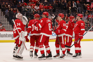 Nov. 26, 2023 ~ Detroit Red Wings celebrate after defeating the Minnesota Wild at Little Caesars Arena. Photo: Rick Osentoski ~ USA TODAY Sports