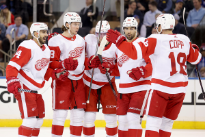 Nov. 29, 2023 ~ Detroit Red Wings defenseman Moritz Seider (53) celebrates his goal against the New York Rangers with center Robby Fabbri (14), right wing Daniel Sprong (17), center Joe Veleno (90), and center Andrew Copp (18) during the second period at Madison Square Garden. Photo: Brad Penner ~ USA TODAY Sports