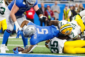 Nov. 23, 2023 ~ Detroit Lions running back David Montgomery (5) runs a touchdown against the Green Bay Packers during the second half at Ford Field in Detroit. Photo: Junfu Han ~ USA TODAY NETWORK