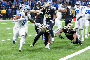Dec. 3, 2023 ~ Detroit Lions running back David Montgomery (5) runs in for a touchdown against New Orleans Saints linebacker Nephi Sewell (45) during the first half at Caesars Superdome. Photo: Stephen Lew ~ USA TODAY Sports