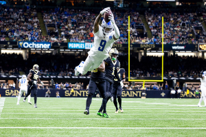 Dec. 3, 2023 ~ Detroit Lions wide receiver Jameson Williams leaps in for a touchdown against the New Orleans Saints during the second half at the Caesars Superdome. Photo: Stephen Lew ~ USA TODAY Sports