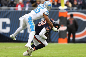 Dec. 10, 2023 ~ Chicago Bears offensive tackle Darnell Wright (58) is tackled by Detroit Lions linebacker Derrick Barnes (55) after a fumble recovery during the second half at Soldier Field. Photo: Mike Dinovo ~ USA TODAY Sports