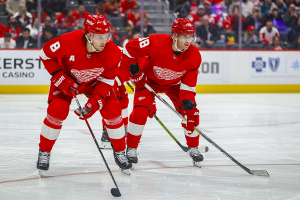 Dec. 7, 2023 ~ Detroit Red Wings right wing Patrick Kane (88) and Detroit Red Wings defenseman Ben Chiarot (8) look on before a face off in the first period at Little Caesars Arena. Photo: Brian Bradshaw Sevald ~ USA TODAY Sports