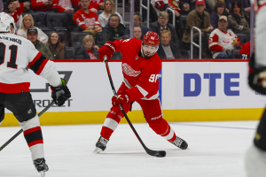 Dec. 9, 2023 ~ Detroit Red Wings defenseman Jake Walman (96) shoots the puck during the second period at Little Caesars Arena. Photo: Brian Bradshaw Sevald ~ USA TODAY Sports