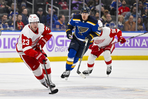 Dec. 12, 2023 ~ Detroit Red Wings left wing Lucas Raymond (23) controls the puck against the St. Louis Blues during the first period at Enterprise Center. Photo: Jeff Curry ~ USA TODAY Sports