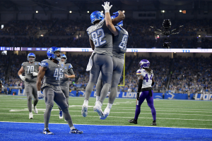 Jan. 7, 2024 ~ Detroit Lions tight end Sam LaPorta (87) celebrates with Detroit Lions tight end James Mitchell (82) after catching a touchdown pass against the Minnesota Vikings in the first quarter at Ford Field. Photo: Lon Horwedel ~ USA TODAY Sports