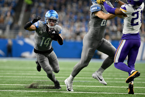 Jan. 7, 2024 ~ Detroit Lions wide receiver Amon-Ra St. Brown (14) runs upfield after catching a pass against the Minnesota Vikings in the first quarter at Ford Field. Photo: Lon Horwedel ~ USA TODAY Sports