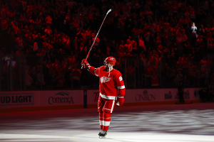 Dec. 29, 2023 ~ Detroit Red Wings defenseman Jake Walman holds his stick in the air after the the Red Wings defeated the Nashville Predators at Little Caesars Arena. Photo: Brian Bradshaw Sevald ~ USA TODAY Sports