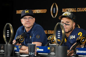 Jan. 8, 2024 ~ Michigan Wolverines head coach Jim Harbaugh smiles during a press conference after winning the 2024 College Football Playoff national championship game against the Washington Huskies at NRG Stadium. Photo: Kirby Lee ~ USA TODAY Sports
