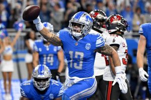 Jan 21, 2024 ~ Detroit Lions running back Craig Reynolds (13) scores a touchdown against the Tampa Bay Buccaneers during the second half in a 2024 NFC divisional round game at Ford Field. Photo: Lon Horwedel ~ USA TODAY Sports