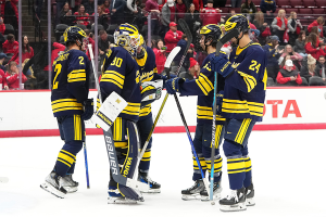 Feb. 2, 2024 ~ The Michigan Wolverines celebrate their 4-2 win over the Ohio State Buckeyes in the NCAA men s hockey game at Value City Arena. Photo: Adam Cairns ~ USA TODAY NETWORK
