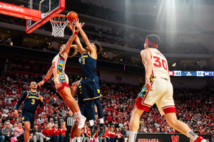 Feb 10, 2024 ~ Nebraska Cornhuskers forward Josiah Allick goes up for a rebound against Michigan Wolverines forward Terrance Williams II during the first half at Pinnacle Bank Arena. Photo: Dylan Widger ~ USA TODAY Sports