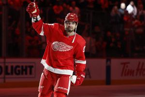 Feb 10, 2024 ~ Detroit Red Wings defenseman Jake Walman is named one of the three stars of the game against Vancouver Canucks goaltender Casey DeSmith in overtime at Little Caesars Arena. Photo: Rick Osentoski ~ USA TODAY Sports