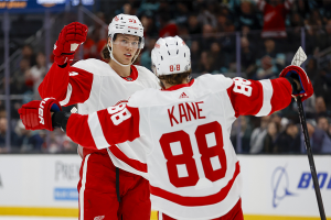 Feb 19, 2024 ~ Detroit Red Wings defenseman Moritz Seider celebrates with right wing Patrick Kane after scoring a goal against the Seattle Kraken during the first period at Climate Pledge Arena. Photo: Joe Nicholson ~ USA TODAY Sports