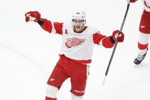 Feb 25, 2024 ~ Detroit Red Wings right wing Patrick Kane celebrates after scoring the game winning goal against the Chicago Blackhawks in overtime at United Center. Photo: Kamil Krzaczynski ~ USA TODAY Sports