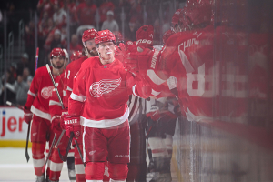 Feb 27, 2024 ~ Detroit Red Wings left wing Lucas Raymond celebrates his goal with teammates during the first period against the Washington Capitals at Little Caesars Arena. Photo: Tim Fuller ~ USA TODAY Sports