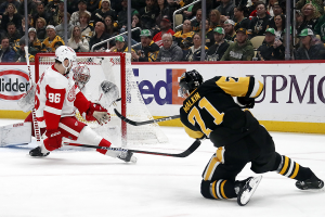 March 17, 2024 ~ Detroit Red Wings goaltender Alex Lyon makes a glove save against Pittsburgh Penguins center Evgeni Malkin as Detroit defenseman Jake Walman defends during the first period at PPG Paints Arena. Photo: Charles LeClaire ~ USA TODAY Sports