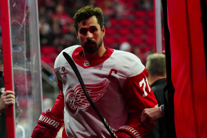 March 28, 2024 ~ Detroit Red Wings center Dylan Larkin comes off the ice after the warmups before the game against the Carolina Hurricanes at PNC Arena. Photo: James Guillory ~ USA TODAY Sports