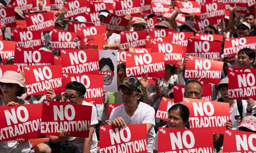 Troops Amass on Hong Kong Border With China as Protests Escalate