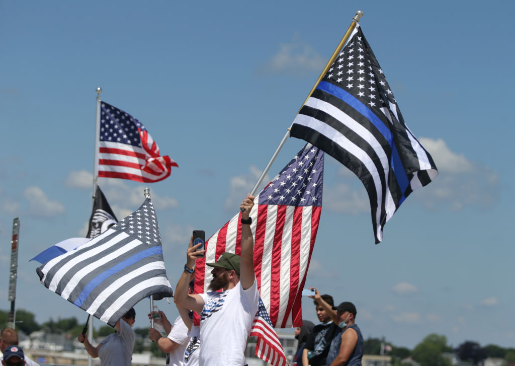 Thin Blue Line Flag Waves Once Again On Football Field