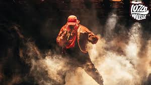 Watch Kanye West Debut Auto-Tuned Track, Perform ‘Pop Style’ Live