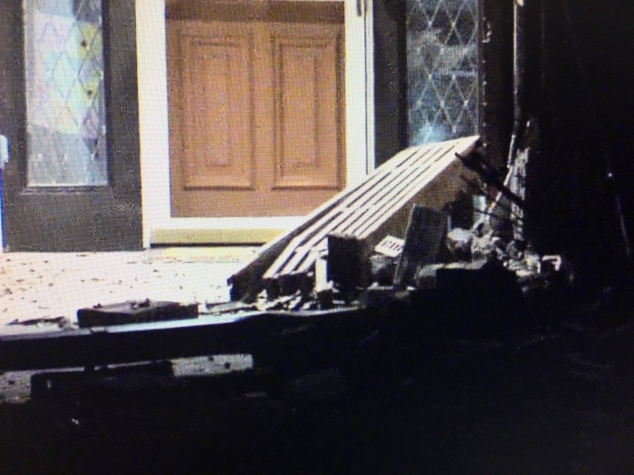 Car Crashes Into House