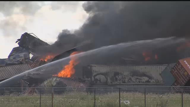 Crews Continue To Work Fiery Train Collision Wreckage In Panhandle