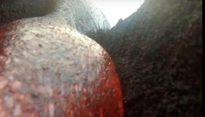 GoPro continues to record as red hot lava burns it up