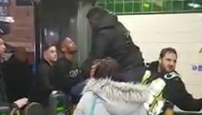 Video: Man gets junk stuck in public transit turnstile